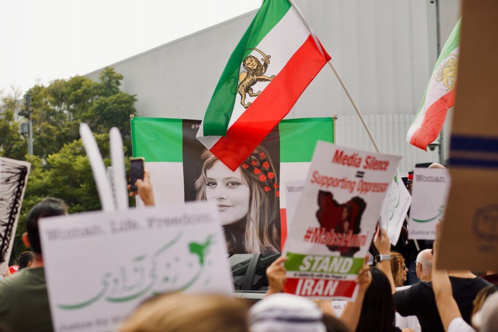 a group of people holding flags